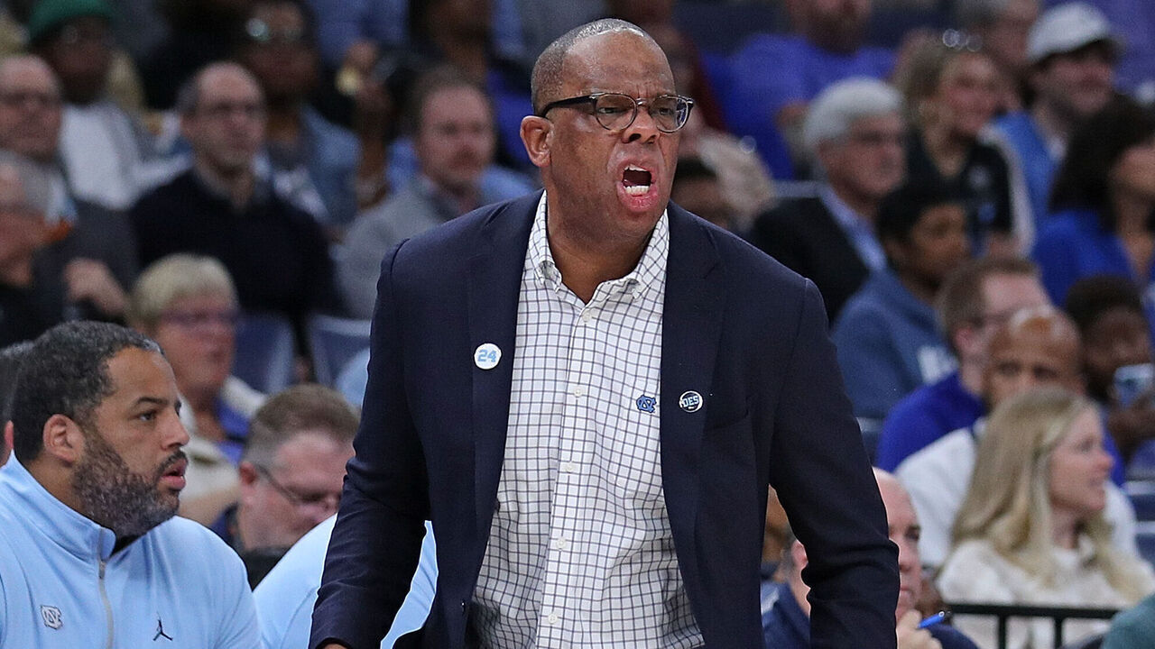 MEMPHIS, TENNESSEE - OCTOBER 15: Head coach Hubert Davis of the North Carolina Tar Heels reacts during the first half against the Memphis Tigers of the charity exhibition game on October 15, 2024 in Memphis, Tennessee.