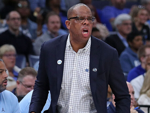MEMPHIS, TENNESSEE - OCTOBER 15: Head coach Hubert Davis of the North Carolina Tar Heels reacts during the first half against the Memphis Tigers of the charity exhibition game on October 15, 2024 in Memphis, Tennessee.