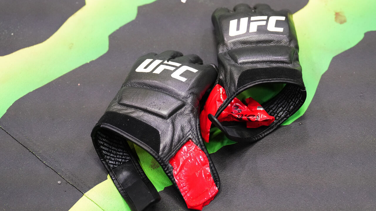LAS VEGAS, NEVADA - SEPTEMBER 07: Matt Schnell leaves his gloves in the center of the Octagon after a submission loss against Cody Durden in a bantamweight fight during the UFC Fight Night event at UFC APEX on September 07, 2024 in Las Vegas, Nevada.