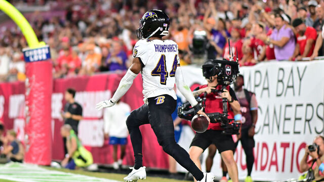 TAMPA, FLORIDA - OCTOBER 21: Marlon Humphrey #44 of the Baltimore Ravens celebrates after making an interception during the second quarter against the Tampa Bay Buccaneers at Raymond James Stadium on October 21, 2024 in Tampa, Florida.