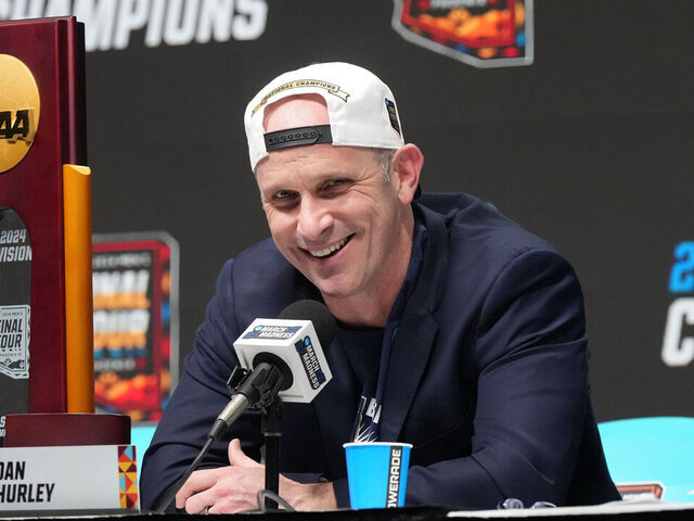 GLENDALE, ARIZONA - APRIL 08: Head coach Dan Hurley of the Connecticut Huskies addresses the media after the National College Basketball Championship game against the Purdue Boilermakers at State Farm Stadium on April 08, 2024 in Glendale, Arizona.