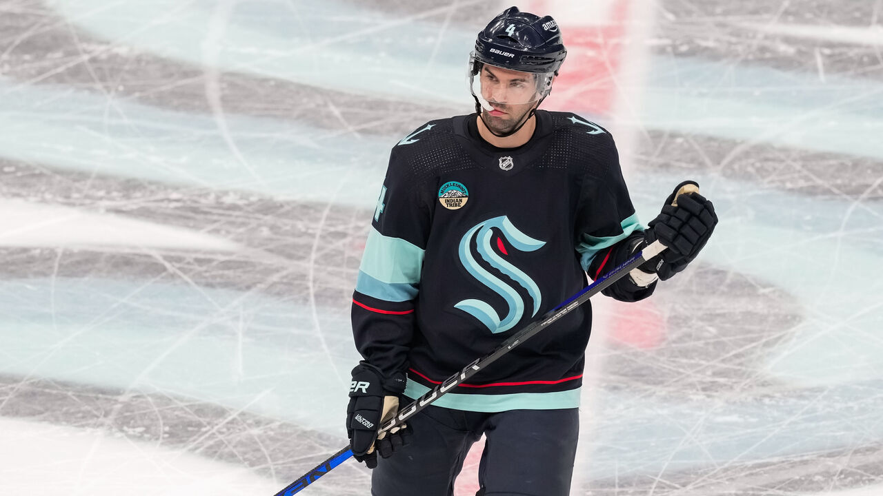 SEATTLE, WASHINGTON - APRIL 11: Justin Schultz #4 of the Seattle Kraken looks on during the second period of a game against the San Jose Sharks at Climate Pledge Arena on April 11, 2024 in Seattle, Washington.