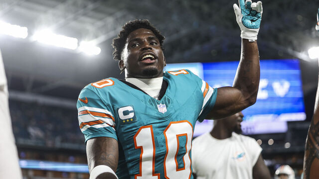 MIAMI GARDENS, FL - SEPTEMBER 12: Tyreek Hill #10 of the Miami Dolphins looks on prior to an NFL football game against the Buffalo Bills at Hard Rock Stadium on September 12, 2024 in Miami Gardens, FL.