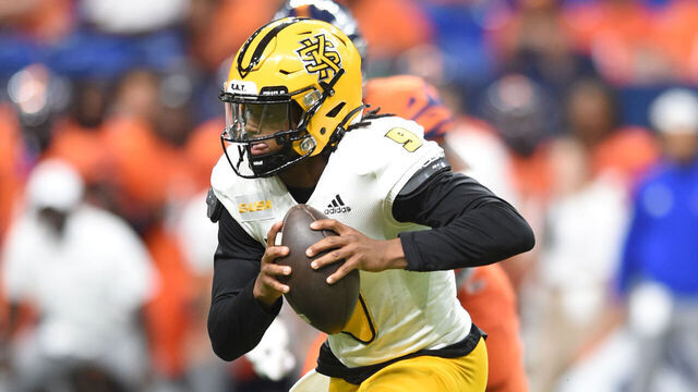 SAN ANTONIO, TX - AUGUST 31: Kennesaw State Owls QB Davis Bryson rolls out during game between the Kennesaw State Owls and the University of Texas - San Antonio Roadrunners on August 31, 2024 at the Alamodome in San Antonio, TX.