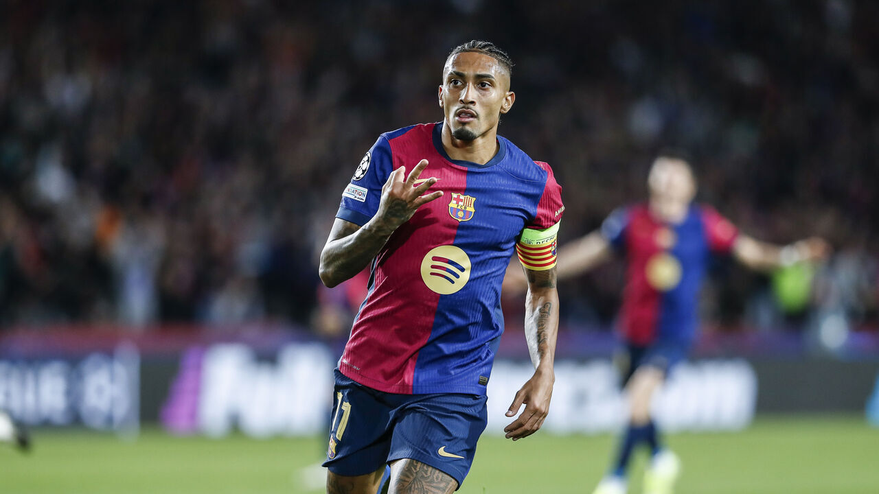 BARCELONA, SPAIN - OCTOBER 23: Raphinha of FC Barcelona celebrates after scoring a goal during the UEFA Champions League 2024/25 League Phase MD3 match between FC Barcelona and FC Bayern Munchen at Estadi Olimpic Lluis Companys on October 23, 2024 in Barcelona, Spain.