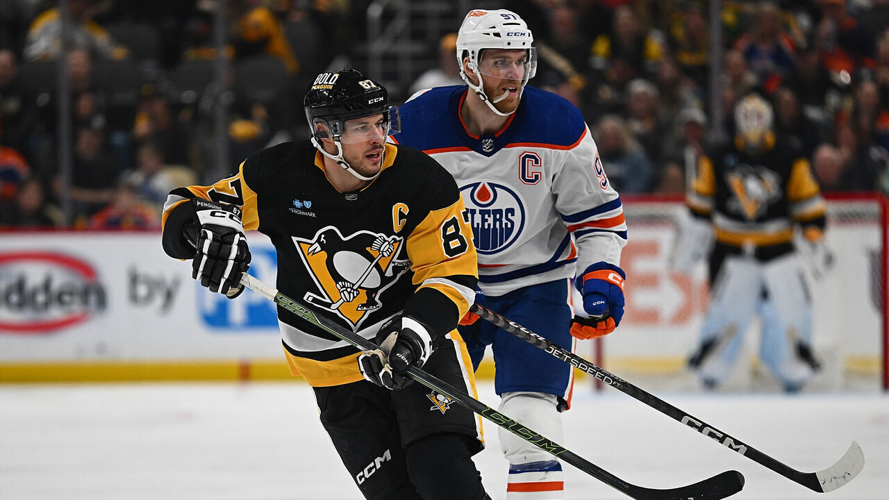 PITTSBURGH, PENNSYLVANIA - MARCH 10: Sidney Crosby #87 of the Pittsburgh Penguins skates against Connor McDavid #97 of the Edmonton Oilers in the third period during the game at PPG PAINTS Arena on March 10, 2024 in Pittsburgh, Pennsylvania.