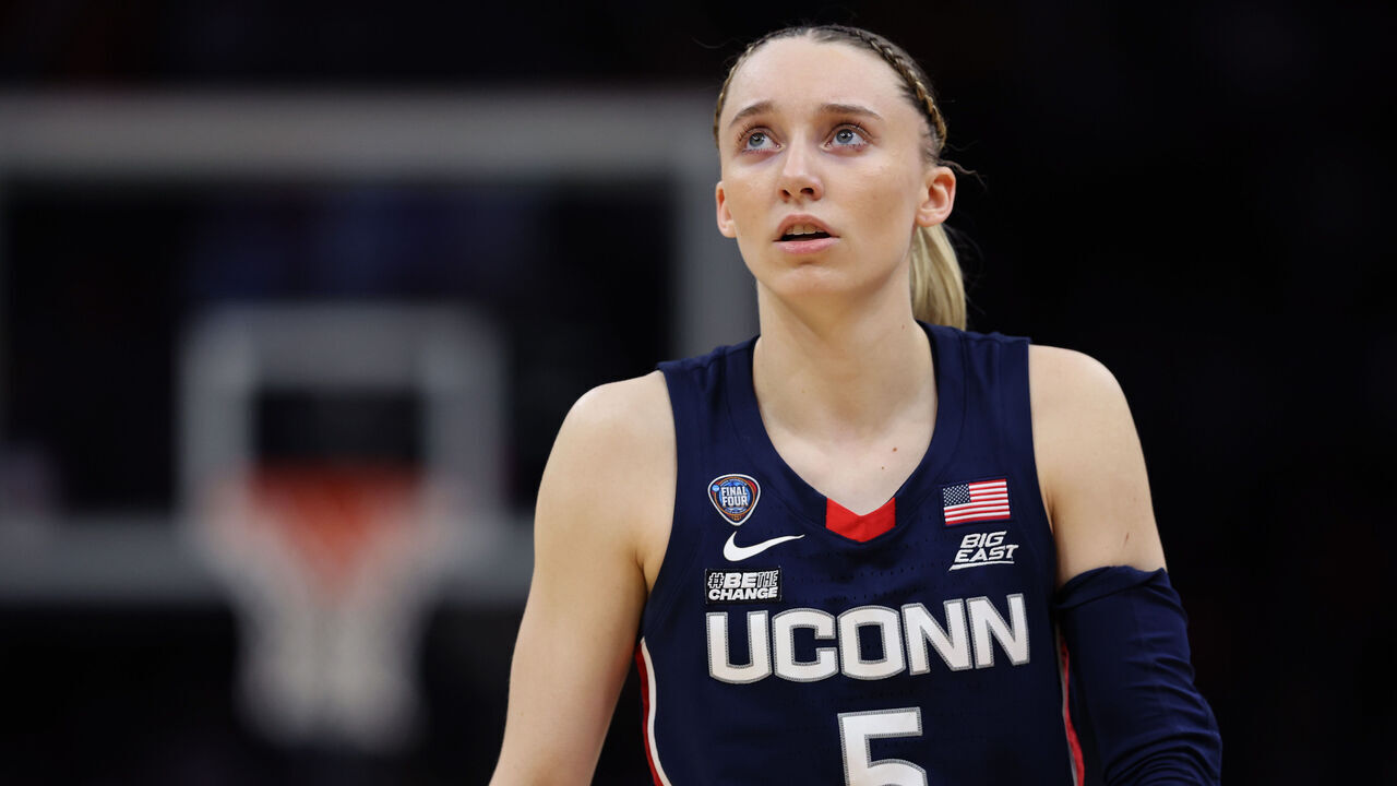 CLEVELAND, OHIO - APRIL 05: Paige Bueckers #5 of the UConn Huskies looks on during the NCAA Women's Basketball Tournament Final Four semifinal game against the Iowa Hawkeyes at Rocket Mortgage Fieldhouse on April 05, 2024 in Cleveland, Ohio.