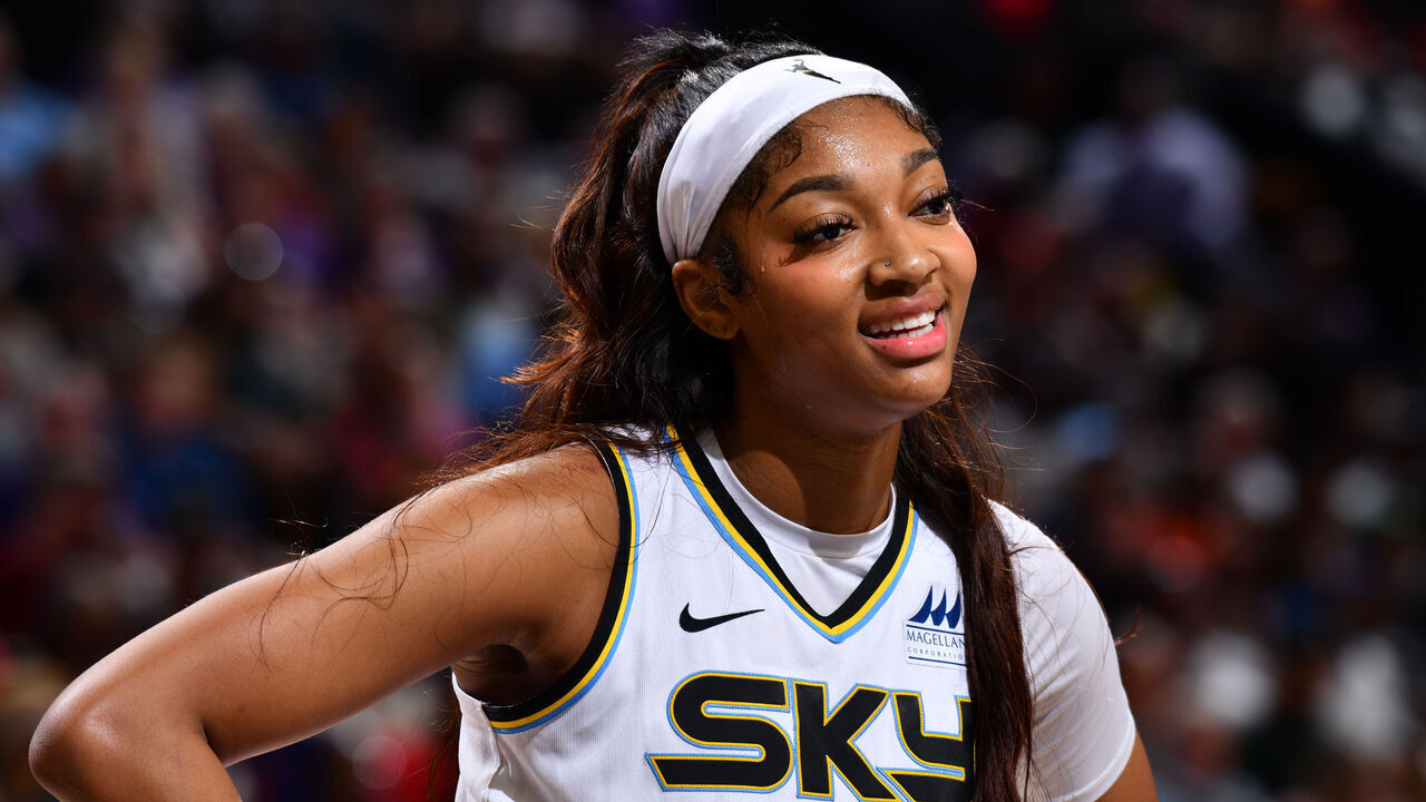 PHOENIX, AZ - AUGUST 18: Angel Reese #5 of the Chicago Sky smiles during the game against the Phoenix Mercury on August 18, 2024 at Footprint Center in Phoenix, Arizona. Mandatory Copyright Notice: Copyright 2024 NBAE