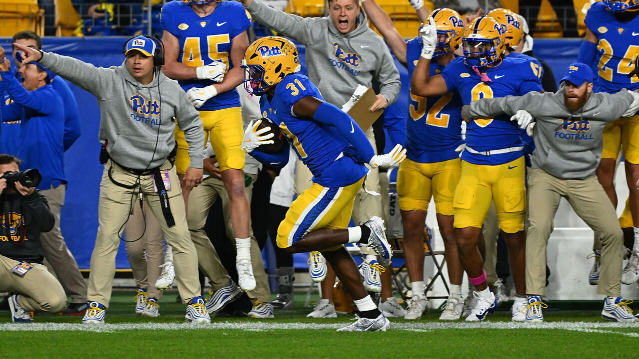 PITTSBURGH, PENNSYLVANIA - OCTOBER 24: Rasheem Biles #31 of the Pittsburgh Panthers returns an interception for a touchdown in the first quarter during the game against the Syracuse Orange at Acrisure Stadium on October 24, 2024 in Pittsburgh, Pennsylvania.
