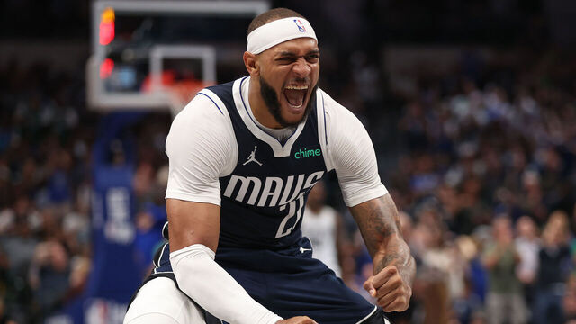 DALLAS, TEXAS - OCTOBER 24: Daniel Gafford #21 of the Dallas Mavericks celebrates a score against the San Antonio Spurs during the third quarter at American Airlines Center on October 24, 2024 in Dallas, Texas.