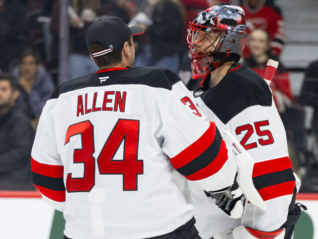 OTTAWA, ON - OCTOBER 17: New Jersey Devils Goalie Jake Allen (34) congratulates Goalie Jacob Markstrom (25) on the win after National Hockey League action between the New Jersey Devils and Ottawa Senators on October 17, 2024, at Canadian Tire Centre in Ottawa, ON, Canada.