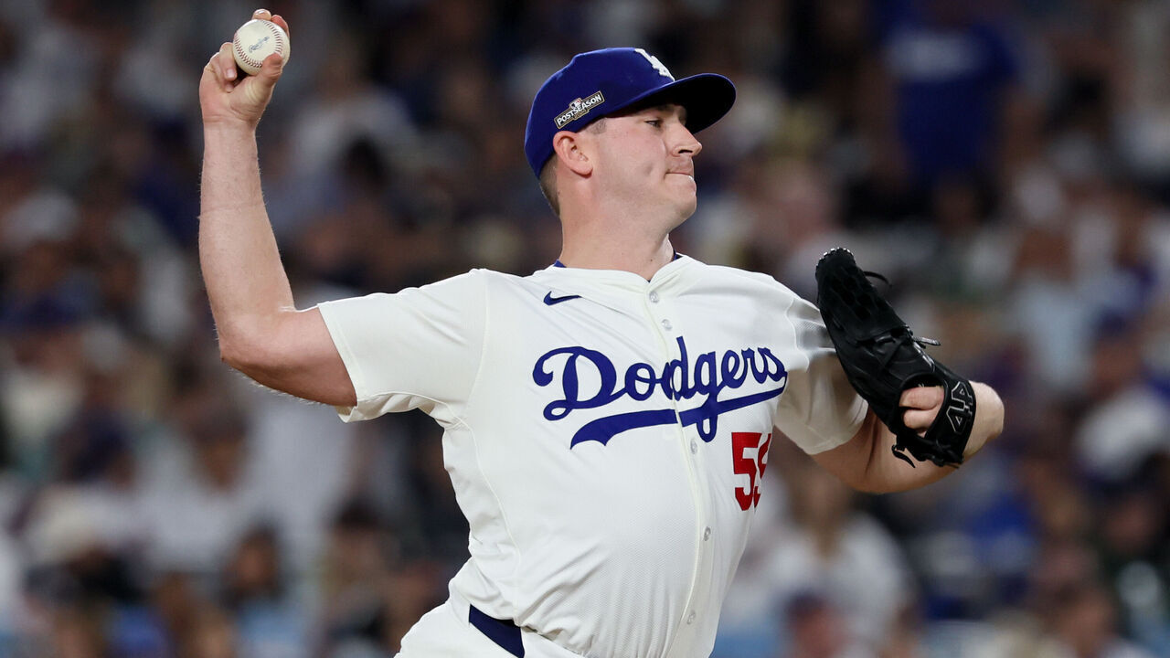 LOS ANGELES, CALIFORNIA - OCTOBER 20: Evan Phillips #59 of the Los Angeles Dodgers delivers a pitch during the sixth inning in game six of the National League Championship Series at Dodger Field on Sunday, Oct. 20, 2024 in Los Angeles. (Robert Gauthier / Los Angeles Times via Getty Images)