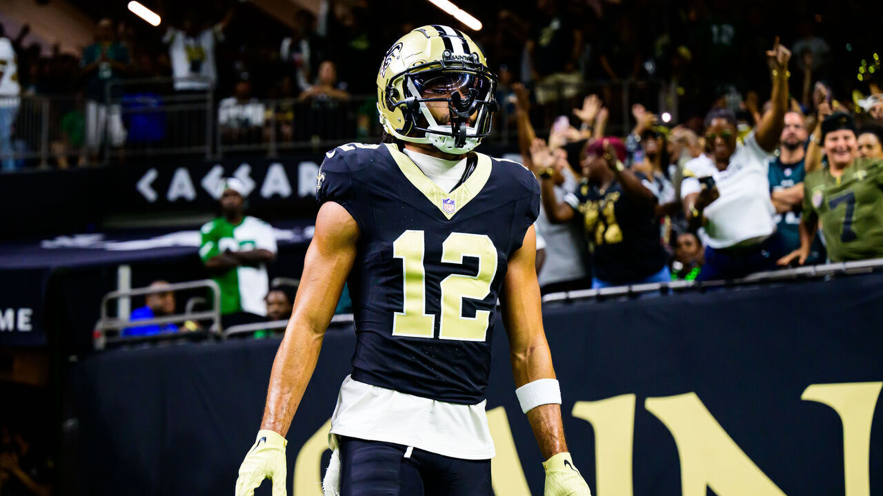 NEW ORLEANS, LOUISIANA - SEPTEMBER 22: Chris Olave #12 of the New Orleans Saints celebrates a touchdown reception against the Philadelphia Eagles during the fourth quarter at Caesars Superdome on September 22, 2024 in New Orleans, Louisiana.