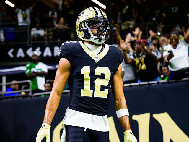 NEW ORLEANS, LOUISIANA - SEPTEMBER 22: Chris Olave #12 of the New Orleans Saints celebrates a touchdown reception against the Philadelphia Eagles during the fourth quarter at Caesars Superdome on September 22, 2024 in New Orleans, Louisiana.