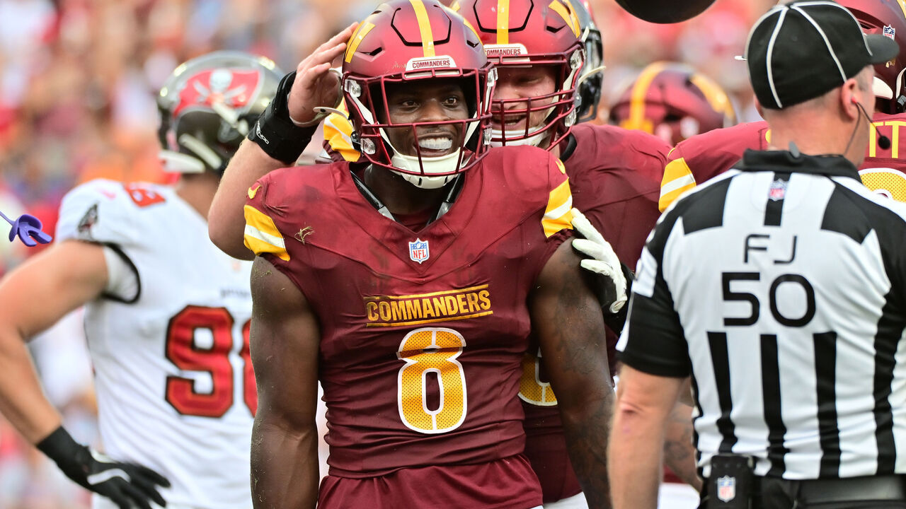 TAMPA, FLORIDA - SEPTEMBER 08: Brian Robinson Jr. #8 of the Washington Commanders celebrates after scoring a touchdown in the second quarter of the game against the Cleveland Browns at Raymond James Stadium on September 08, 2024 in Tampa, Florida.