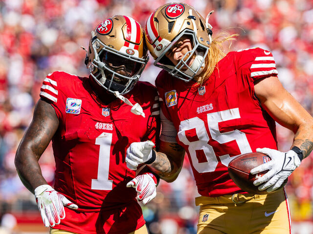 SANTA CLARA, CA - SEPTEMBER 29: San Francisco 49ers tight end George Kittle (85) celebrates a touchdown with San Francisco 49ers wide receiver Deebo Samuel Sr. (1) during the NFL game between the New England Patriots and the San Francisco 49ers on September 29, 2024 at Levi's Stadium in Santa Clara, CA.