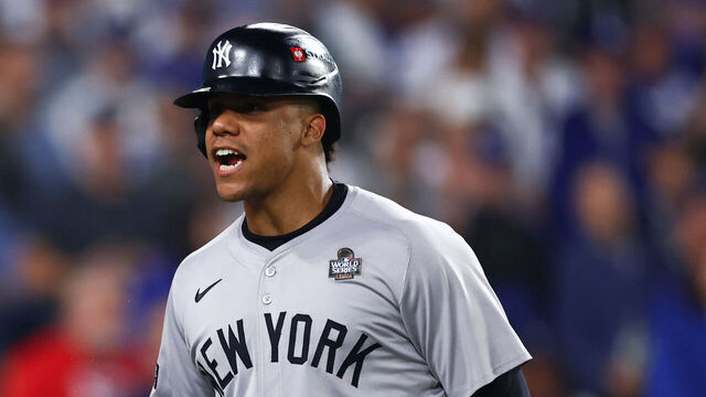 LOS ANGELES, CALIFORNIA - OCTOBER 25: Juan Soto #22 reacts after scoring on a home run hit by Giancarlo Stanton #27 of the New York Yankees against the Los Angeles Dodgers during Game One of the 2024 World Series at Dodger Stadium on October 25, 2024 in Los Angeles, California.