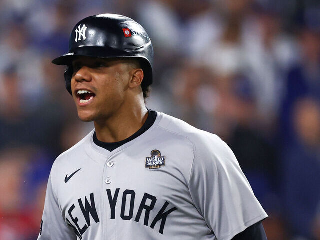 LOS ANGELES, CALIFORNIA - OCTOBER 25: Juan Soto #22 reacts after scoring on a home run hit by Giancarlo Stanton #27 of the New York Yankees against the Los Angeles Dodgers during Game One of the 2024 World Series at Dodger Stadium on October 25, 2024 in Los Angeles, California.