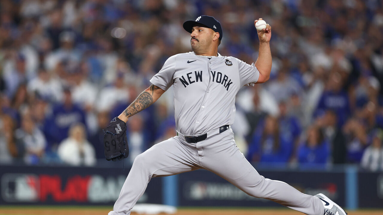 LOS ANGELES, CALIFORNIA - OCTOBER 25: Nestor Cortes #65 of the New York Yankees pitches in the tenth inning against the Los Angeles Dodgers during Game One of the 2024 World Series at Dodger Stadium on October 25, 2024 in Los Angeles, California.