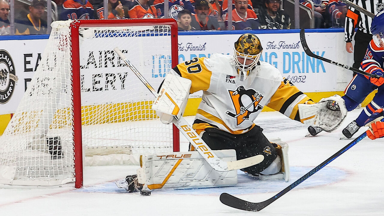 EDMONTON, AB - OCTOBER 25: Pittsburgh Penguins Goalie Joel Blomqvist (30) makes a save on Edmonton Oilers Right Wing Vasily Podkolzin (92) in game action in the first period of the Edmonton Oilers game versus the Pittsburgh Penguins on October 25, 2024 at Rogers Place in Edmonton, AB.