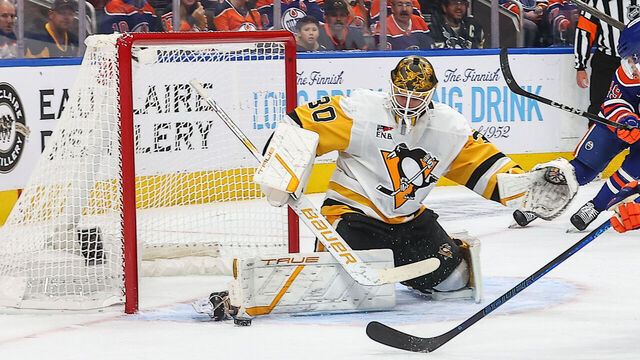 EDMONTON, AB - OCTOBER 25: Pittsburgh Penguins Goalie Joel Blomqvist (30) makes a save on Edmonton Oilers Right Wing Vasily Podkolzin (92) in game action in the first period of the Edmonton Oilers game versus the Pittsburgh Penguins on October 25, 2024 at Rogers Place in Edmonton, AB.