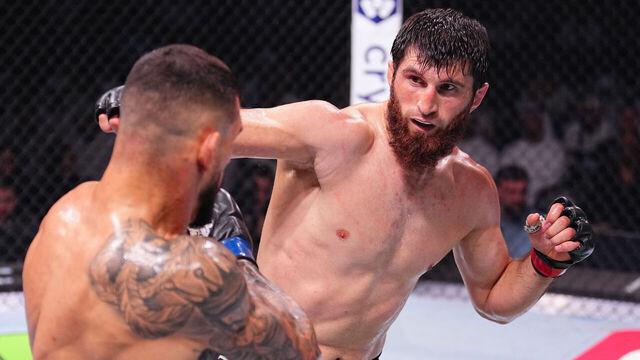 ABU DHABI, UNITED ARAB EMIRATES - OCTOBER 26: (R-L) Magomed Ankalaev of Russia punches Aleksandar Rakic of Austria in a light heavyweight fight during the UFC 308 event at Etihad Arena on October 26, 2024 in Abu Dhabi, United Arab Emirates.