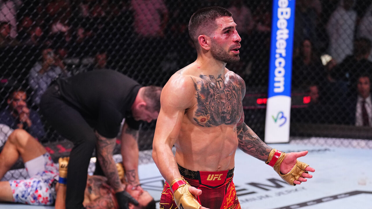 ABU DHABI, UNITED ARAB EMIRATES - OCTOBER 26: Ilia Topuria of Spain reacts after a knockout victory against Max Holloway in the UFC featherweight championship fight during the UFC 308 event at Etihad Arena on October 26, 2024 in Abu Dhabi, United Arab Emirates.