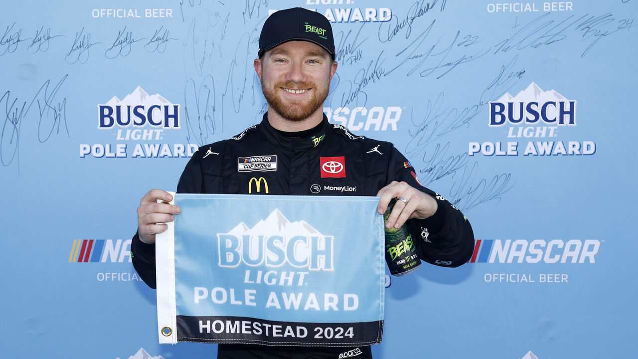 HOMESTEAD, FLORIDA - OCTOBER 26: Tyler Reddick, driver of the #45 The Beast Killer Sunrise Toyota, poses for photos after winning the pole award during qualifying for the the NASCAR Cup Series Straight Talk Wireless 400 at Homestead-Miami Speedway on October 26, 2024 in Homestead, Florida.