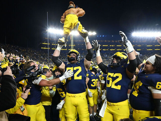 ANN ARBOR, MI - OCTOBER 26: Michigan Wolverines offensive lineman Tristan Bounds (72) and the team celebrate their 24-17 victory to keep the Paul Bunyan Trophy during the Michigan Wolverines versus the Michigan State Spartans game on Saturday October 26, 2024 at Michigan Stadium in Ann Arbor, MI.