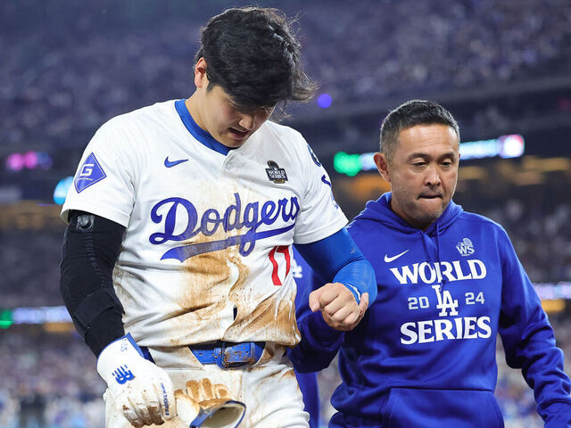 LOS ANGELES, CALIFORNIA - OCTOBER 26: Shohei Ohtani #17 of the Los Angeles Dodgers walks off the field after being injured while attempting to steal second base as they play against the New York Yankees in the seventh inning during Game Two of the 2024 World Series at Dodger Stadium on October 26, 2024 in Los Angeles, California.