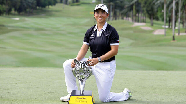 KUALA LUMPUR, MALAYSIA - OCTOBER 27: Ruoning Yin of China poses with the trophy after winning the tournament following the final round of the Maybank Championship 2024 at Kuala Lumpur Golf & Country Club on October 27, 2024 in Kuala Lumpur, Malaysia.