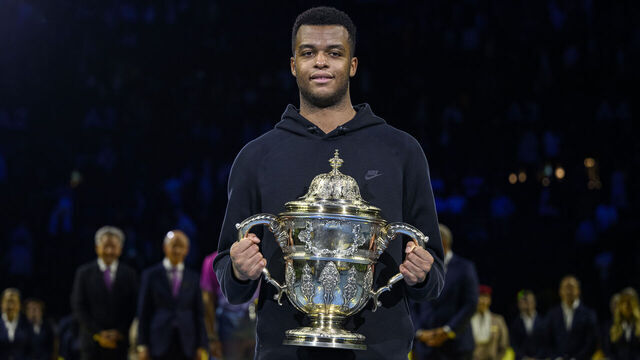 BASEL, SWITZERLAND - OCTOBER 27: Giovanni Mpetshi Perricard of France poses for photos with his men's singles winner trophy after his match against Ben Shelton of USA during the Swiss Indoors Basel - Day 7 at St. Jakobshalle on October 27, 2024 in Basel, Switzerland.