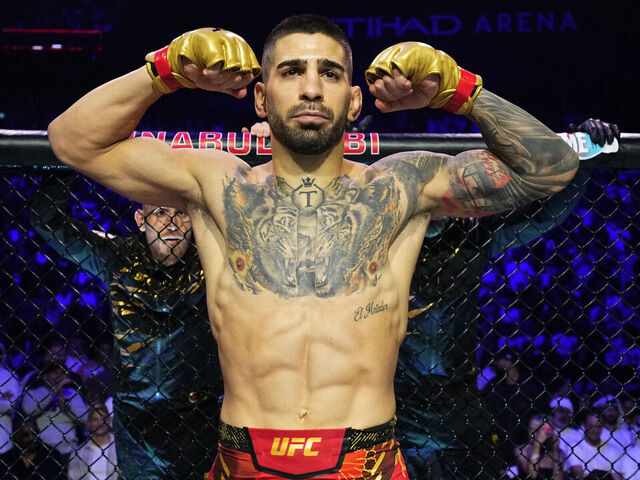 ABU DHABI, UNITED ARAB EMIRATES - OCTOBER 26:Ilia Topuria of Spain prepares to face Max Holloway in the UFC featherweight championship fight during the UFC 308 event at Etihad Arena on October 26, 2024 in Abu Dhabi, United Arab Emirates.