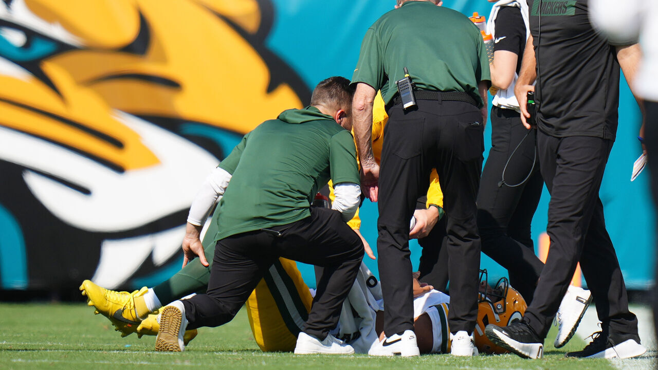 JACKSONVILLE, FLORIDA - OCTOBER 27: Jordan Love #10 of the Green Bay Packers reacts on the field after an injury during the third quarter against the Jacksonville Jaguars at EverBank Stadium on October 27, 2024 in Jacksonville, Florida.