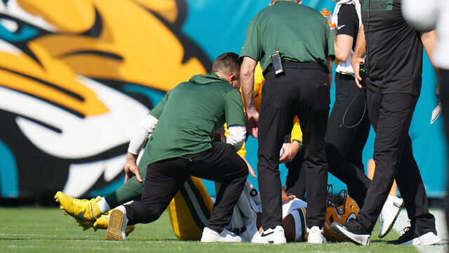JACKSONVILLE, FLORIDA - OCTOBER 27: Jordan Love #10 of the Green Bay Packers reacts on the field after an injury during the third quarter against the Jacksonville Jaguars at EverBank Stadium on October 27, 2024 in Jacksonville, Florida.