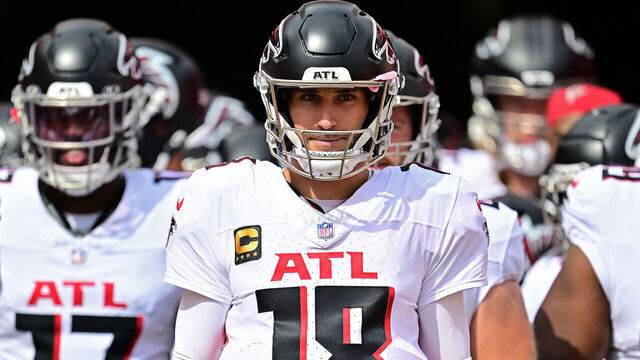 TAMPA, FLORIDA - OCTOBER 27: Kirk Cousins #18 of the Atlanta Falcons prepares to lead the team onto the field to face the Tampa Bay Buccaneers at Raymond James Stadium on October 27, 2024 in Tampa, Florida.