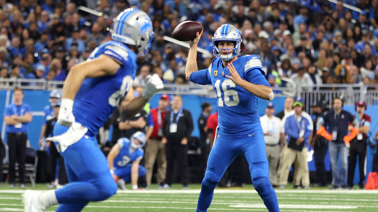 DETROIT, MICHIGAN - OCTOBER 27: Jared Goff #16 of the Detroit Lions looks to pass in the third quarter of a game against the Tennessee Titans at Ford Field on October 27, 2024 in Detroit, Michigan.