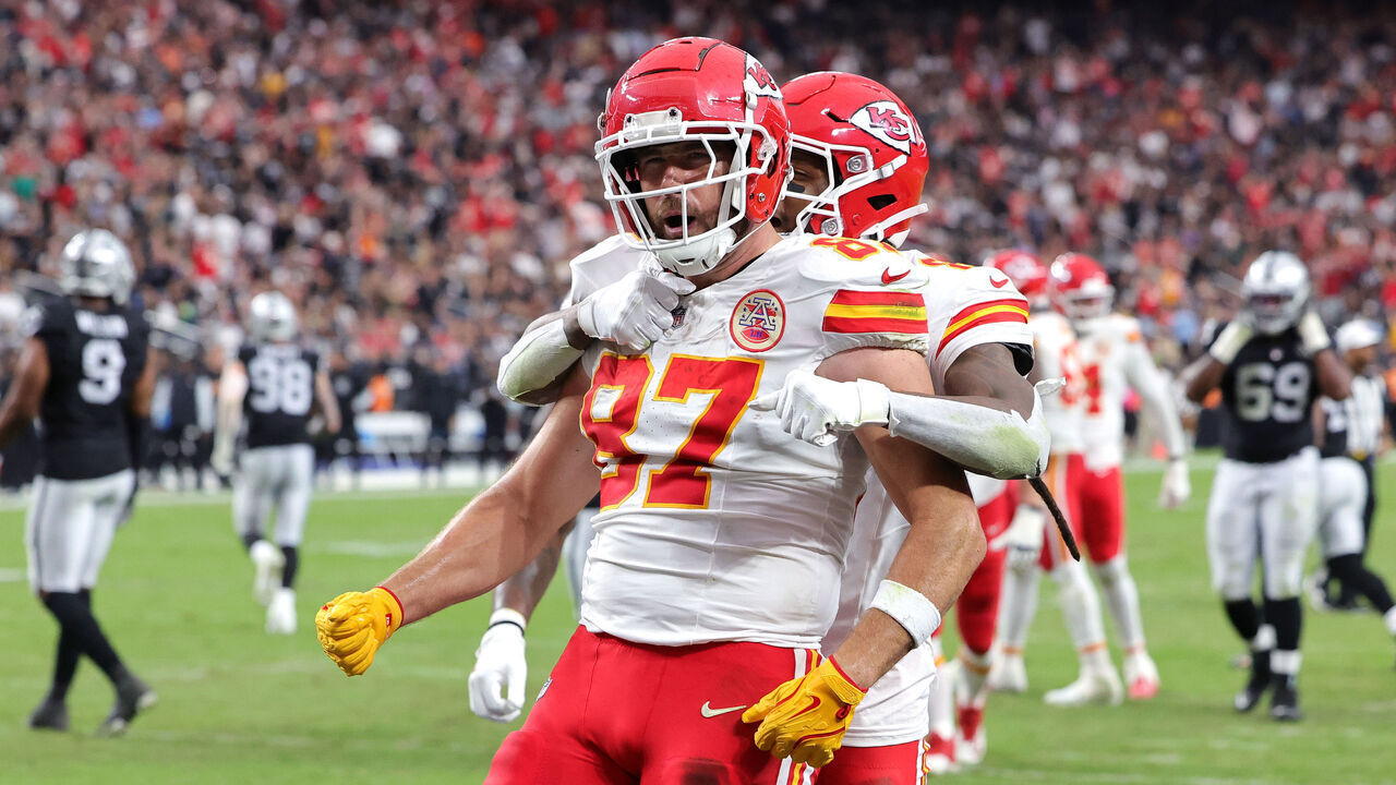 LAS VEGAS, NEVADA - OCTOBER 27: DeAndre Hopkins #8 and Travis Kelce #87 of the Kansas City Chiefs celebrate after Kelce's receiving touchdown in the second quarter of a game against the Las Vegas Raiders at Allegiant Stadium on October 27, 2024 in Las Vegas, Nevada.