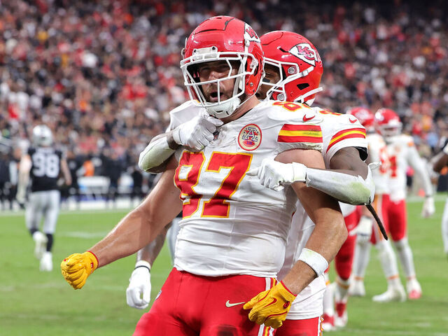 LAS VEGAS, NEVADA - OCTOBER 27: DeAndre Hopkins #8 and Travis Kelce #87 of the Kansas City Chiefs celebrate after Kelce's receiving touchdown in the second quarter of a game against the Las Vegas Raiders at Allegiant Stadium on October 27, 2024 in Las Vegas, Nevada.