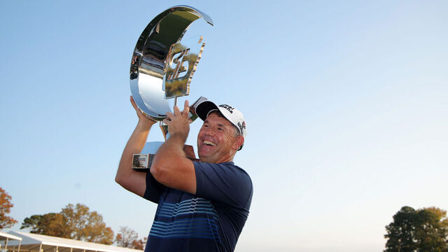 LITTLE ROCK, ARKANSAS - OCTOBER 27: Padraig Harrington of Ireland poses with the trophy after winning the Simmons Bank Championship 2024 at Pleasant Valley Country Club on October 27, 2024 in Little Rock, Arkansas.