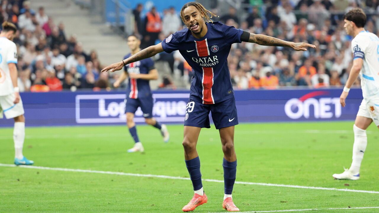 MARSEILLE, FRANCE - OCTOBER 27: Bradley Barcola #29 of Paris Saint-Germain celebrates his first goal during the Ligue 1 McDonald's match between Olympique de Marseille and Paris Saint-Germain at Orange Velodrome on October 27, 2024 in Marseille, France.