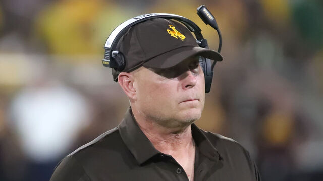 TEMPE, ARIZONA - AUGUST 31: Head Coach Jay Sawvel of the Wyoming Cowboys watches his team from the sidelines during a game between the Wyoming Cowboys and the Arizona State Sun Devils at Mountain America Stadium on August 31, 2024 in Tempe, Arizona.