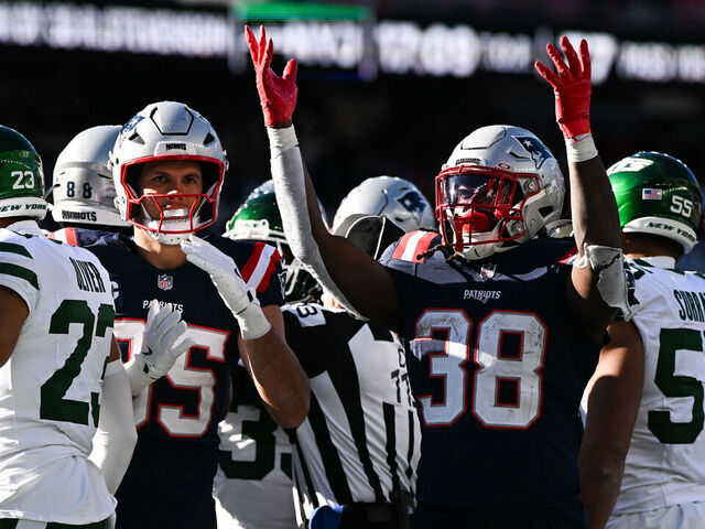 FOXBOROUGH, MASSACHUSETTS - OCTOBER 27: Rhamondre Stevenson #38 of the New England Patriots reacts after scoring a touchdown against the New York Jets in the third quarter at Gillette Stadium on October 27, 2024 in Foxborough, Massachusetts.