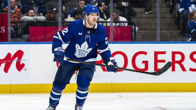 TORONTO, ON - NOVEMBER 21: Toronto Maple Leafs defenseman Jake McCabe #22 skates against the Tampa Bay Lightning at the Scotiabank Arena on November 21, 2024 in Toronto, Ontario, Canada.