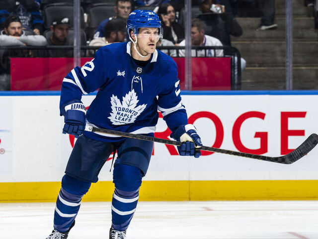 TORONTO, ON - NOVEMBER 21: Toronto Maple Leafs defenseman Jake McCabe #22 skates against the Tampa Bay Lightning at the Scotiabank Arena on November 21, 2024 in Toronto, Ontario, Canada.