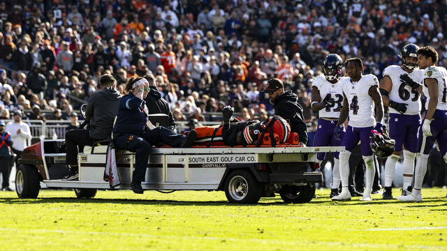 CLEVELAND, OHIO - OCTOBER 27: Jeremiah Owusu-Koramoah #6 of the Cleveland Browns is carted off of the field after an injury in the third quarter of the game against the Baltimore Ravens at Huntington Bank Field on October 27, 2024 in Cleveland, Ohio. The Browns beat the Ravens 29-24.