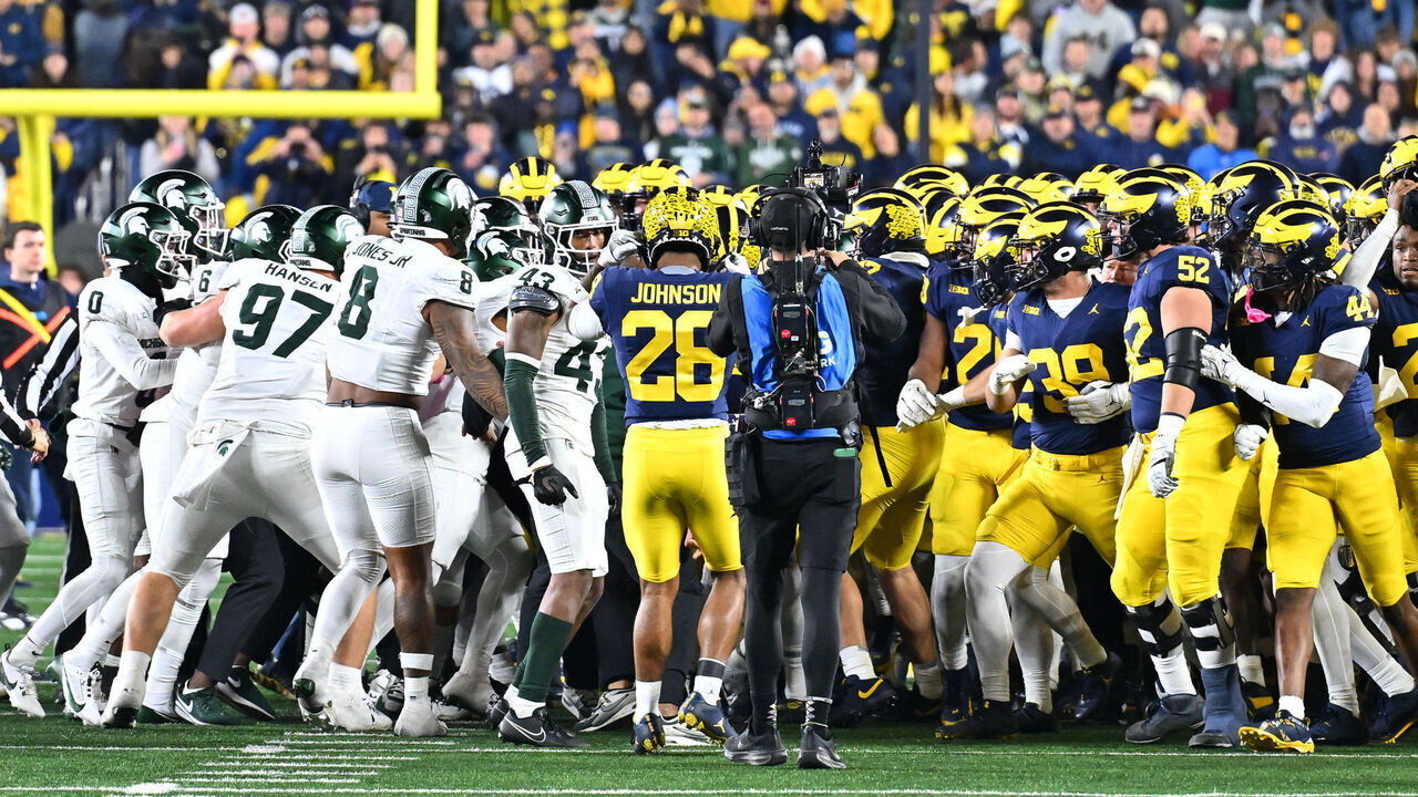 ANN ARBOR, MI - OCTOBER 26: The Michigan Wolverines and Michigan State Spartans come together in a fight at the end of the game during the Michigan Wolverines versus the Michigan State Spartans game on Saturday October 26, 2024 at Michigan Stadium in Ann Arbor, MI.