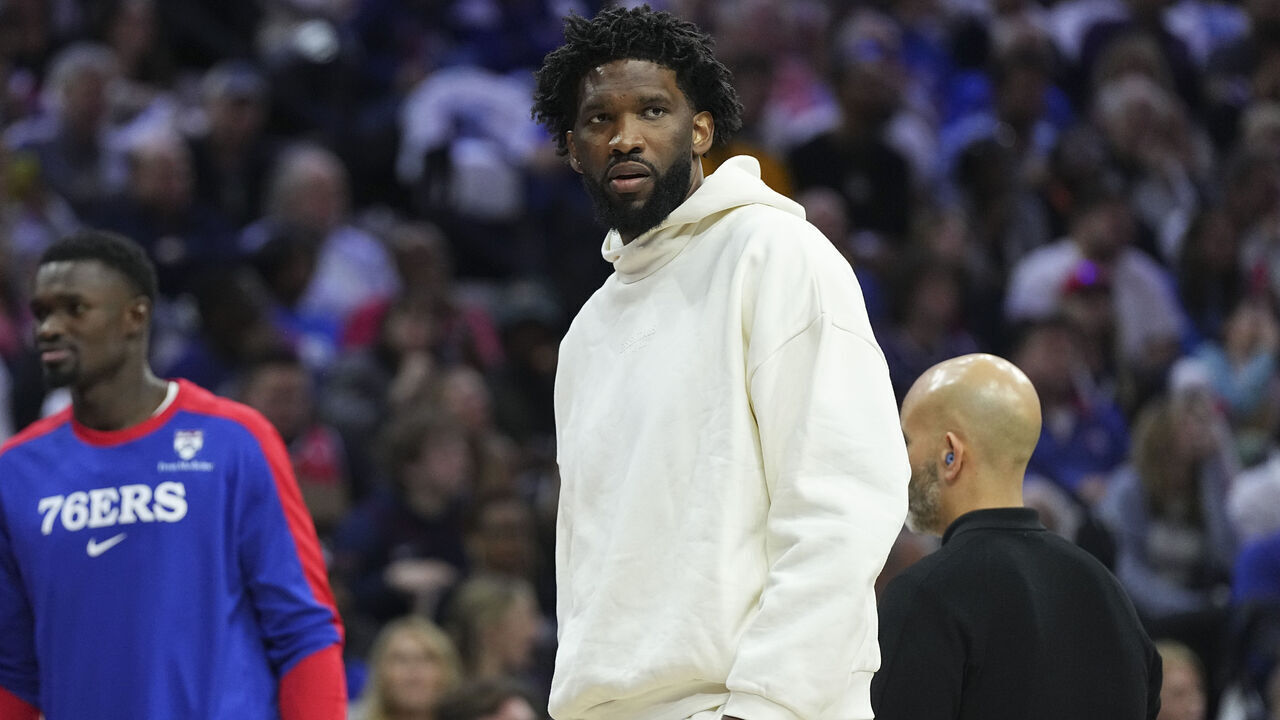 PHILADELPHIA, PENNSYLVANIA - OCTOBER 23: Joel Embiid #21 of the Philadelphia 76ers looks on during a timeout against the Milwaukee Bucks in the first half at the Wells Fargo Center on October 23, 2024 in Philadelphia, Pennsylvania. NOTE TO USER: User expressly acknowledges and agrees that, by downloading and/or using this photograph, user is consenting to the terms and conditions of the Getty Images License Agreement.