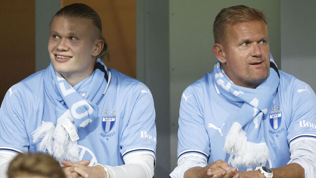 Manchester City's Norwegian forward Erling Haaland (L) sits next to his father Alf-Inge Haaland (R) in the stands during the Allsvenskan football match between Malmo FF and IFK Gothenburg at the Eleda Stadium in Malmo, on October 28, 2024.