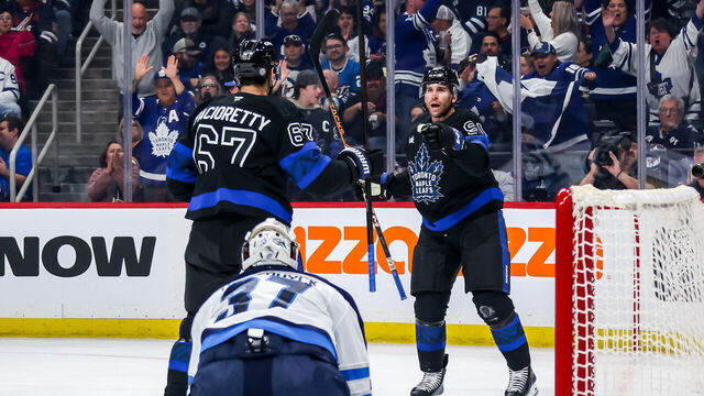 WINNIPEG, CANADA - OCTOBER 28: Max Pacioretty #67 and John Tavares #91 of the Toronto Maple Leafs celebrate a first period goal against the Winnipeg Jets at the Canada Life Centre on October 28, 2024 in Winnipeg, Manitoba, Canada.
